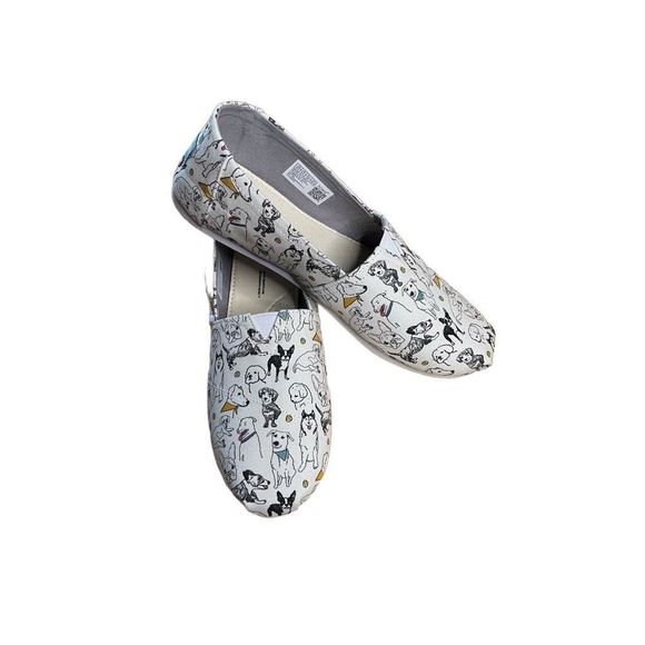 Toms Shoes - Nwt TOMS size 8.5 womens natural Dogs Slip on shoes.